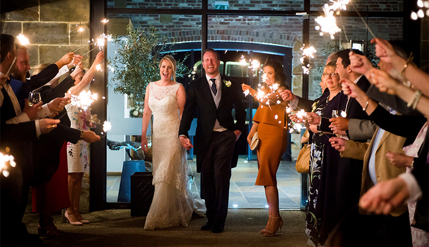 Wedding sparklers at night at Hendall Manor Barns