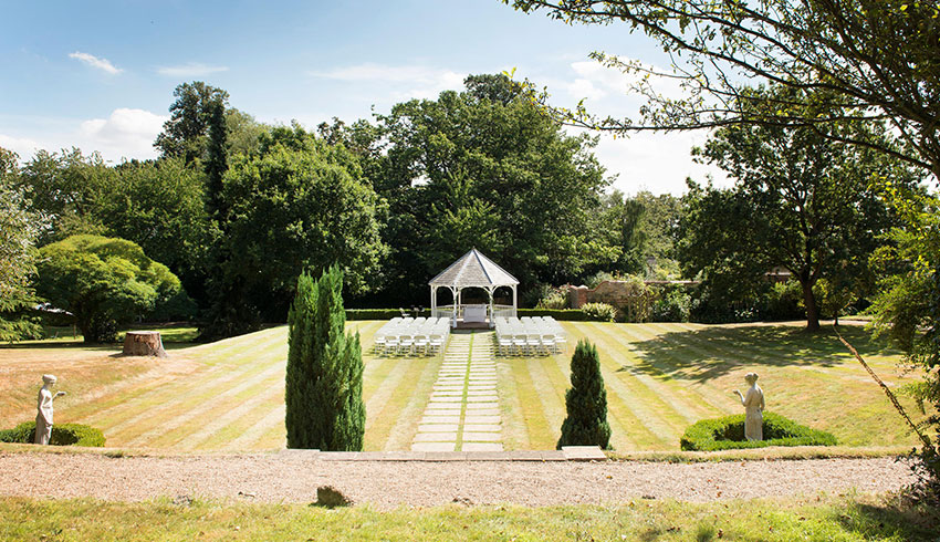 The outdoor wedding ceremony space at Rowhill Grange, a Kent wedding venue